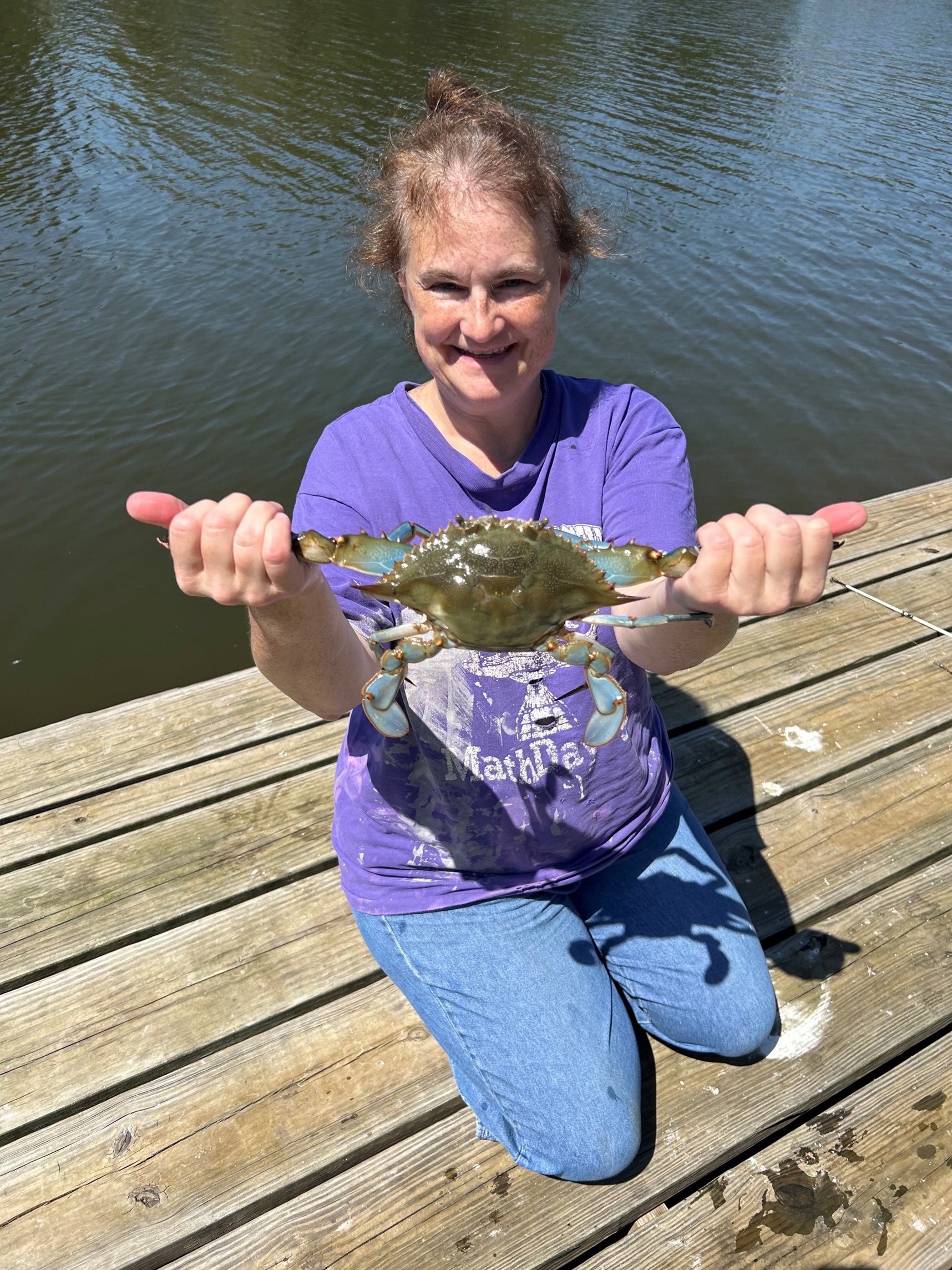 Ms. Johnson with a crab